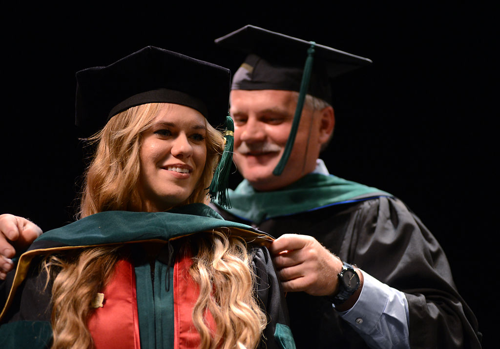 Natalie Kukulka is hooded by her father Peter Kukulka